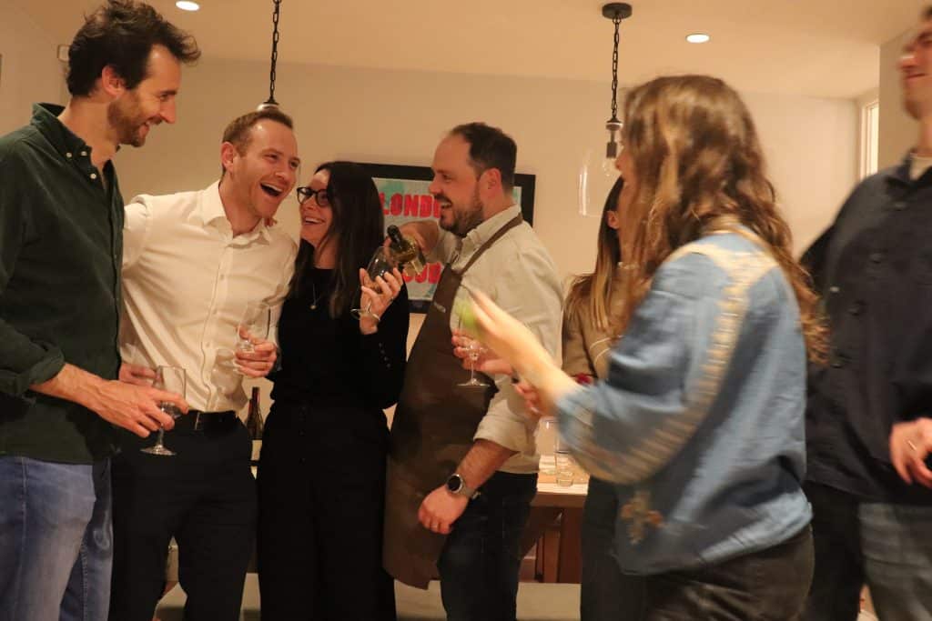 People laughing at a Wine Night In