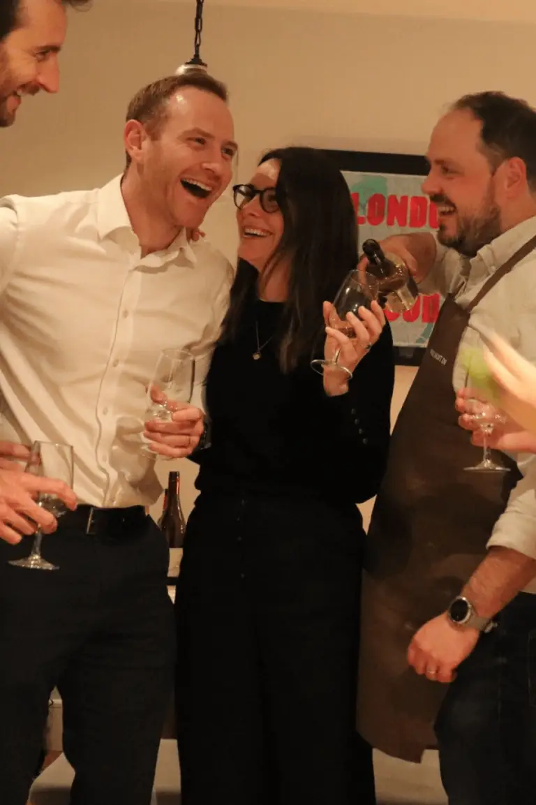 Group laughing at Wine Night In