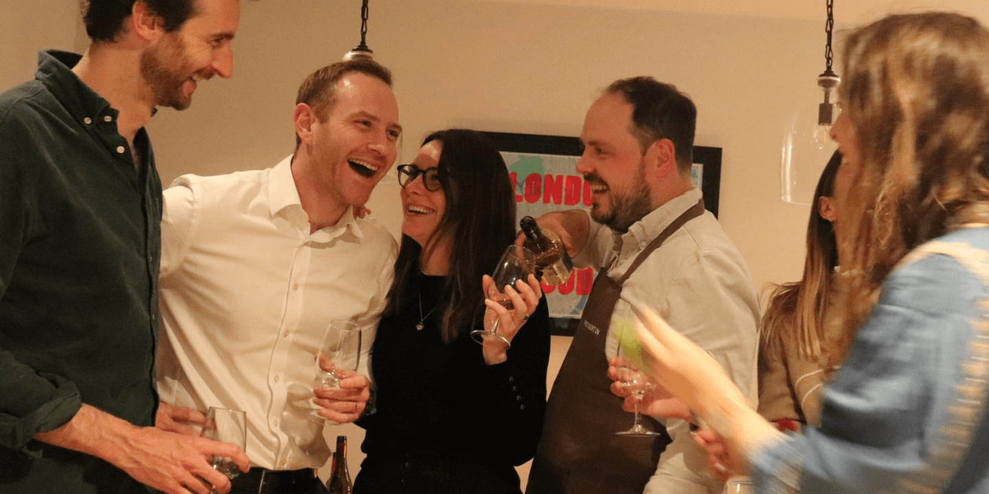 Group laughing at Wine Night In