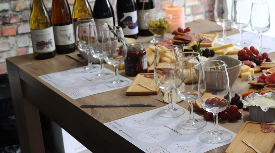 Girls night in wine tasting at home in Guildford Surrey with friends and charcuterie boards